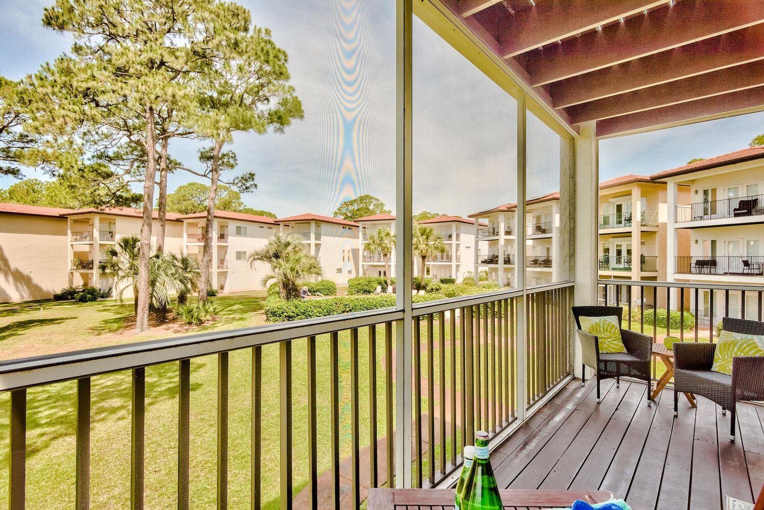 114 Mar-A-Lago Boulevard, Unit 1 Santa Rosa Beach, FL 32459 - Photo 10 of 28 a view of a balcony with chairs