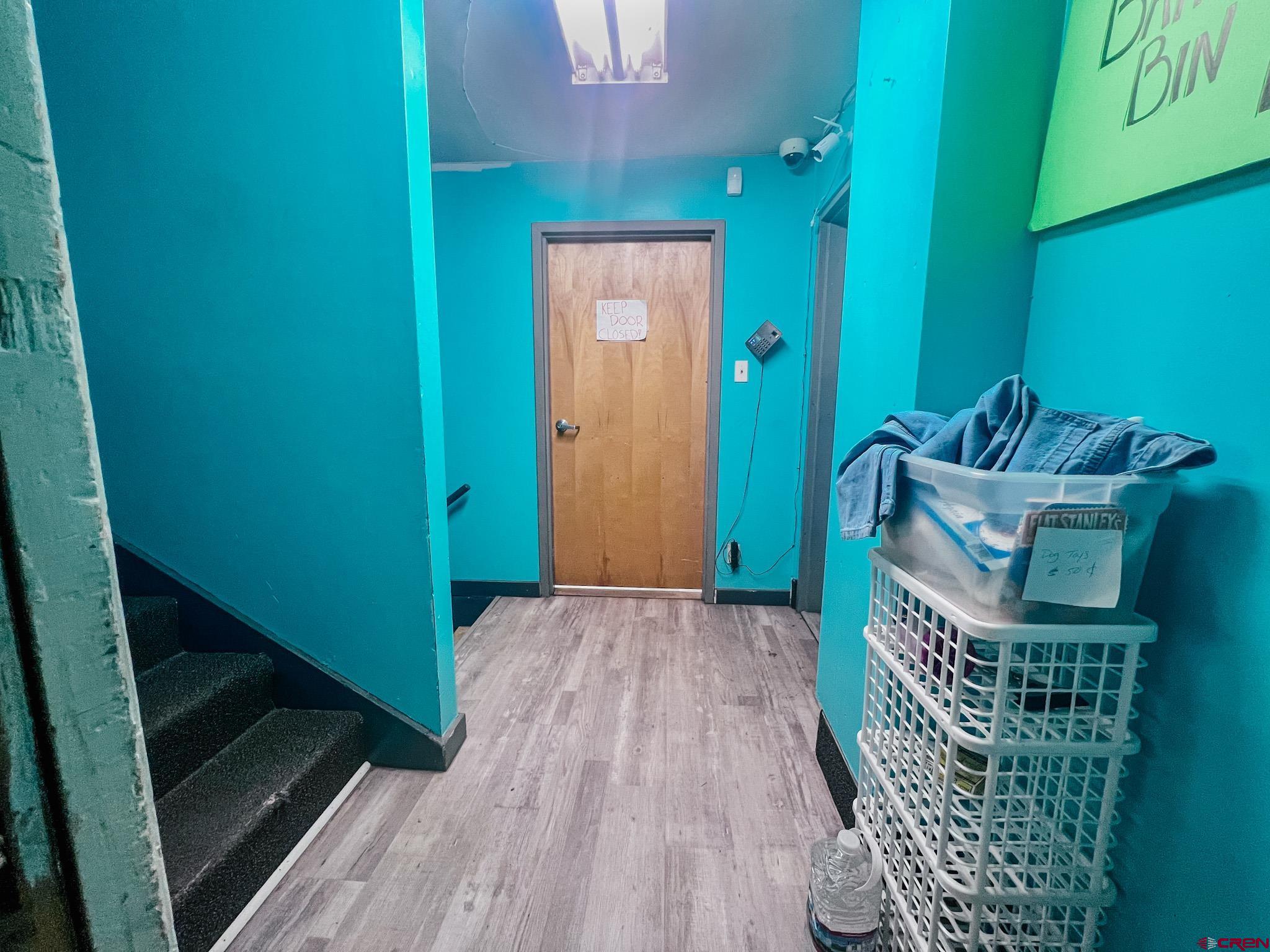 209 West Main Street Cortez, CO 81321 - Photo 15 of 18 a view of entryway with wooden floor