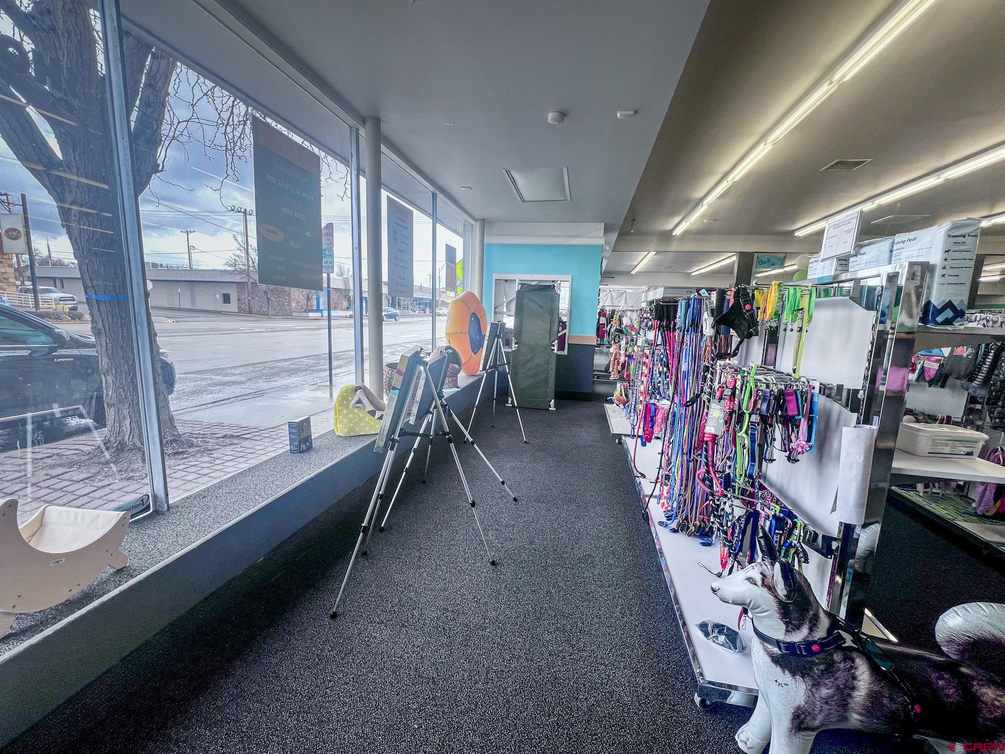 209 West Main Street Cortez, CO 81321 - Photo 4 of 18 a view of a room with gym equipment