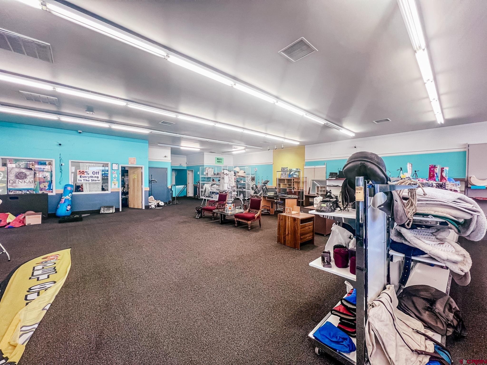 209 West Main Street Cortez, CO 81321 - Photo 9 of 18 a view of a room with gym equipment