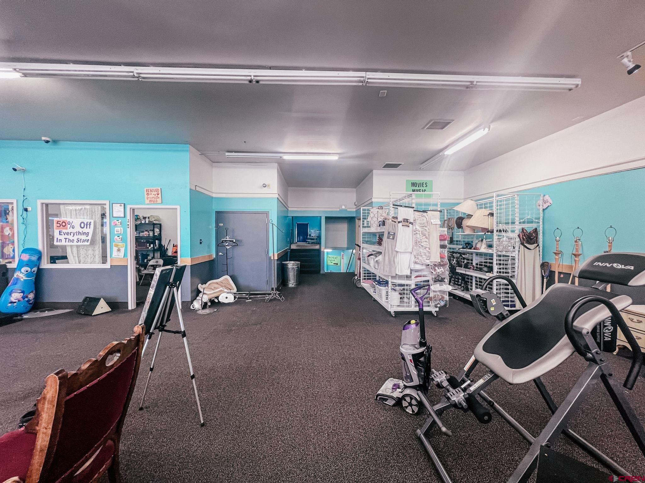 209 West Main Street Cortez, CO 81321 - Photo 10 of 18 a view of a room with gym equipment