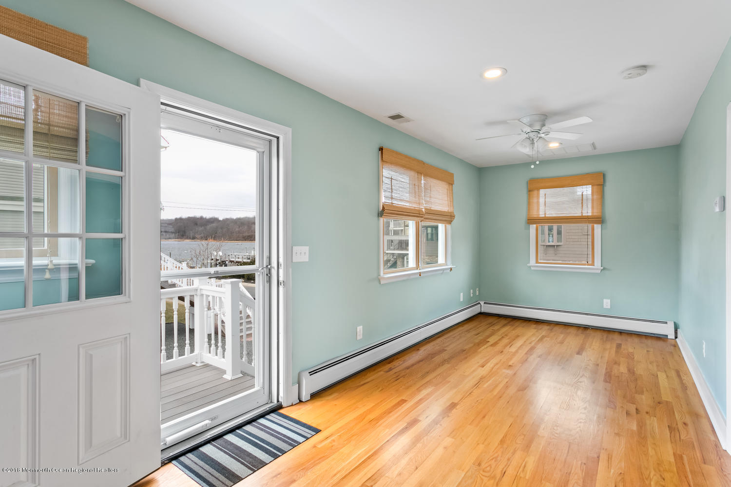 1 Beach Way, Unit A Sea Bright, NJ 07760 - Photo 6 of 15 wooden floor in an empty room with a window