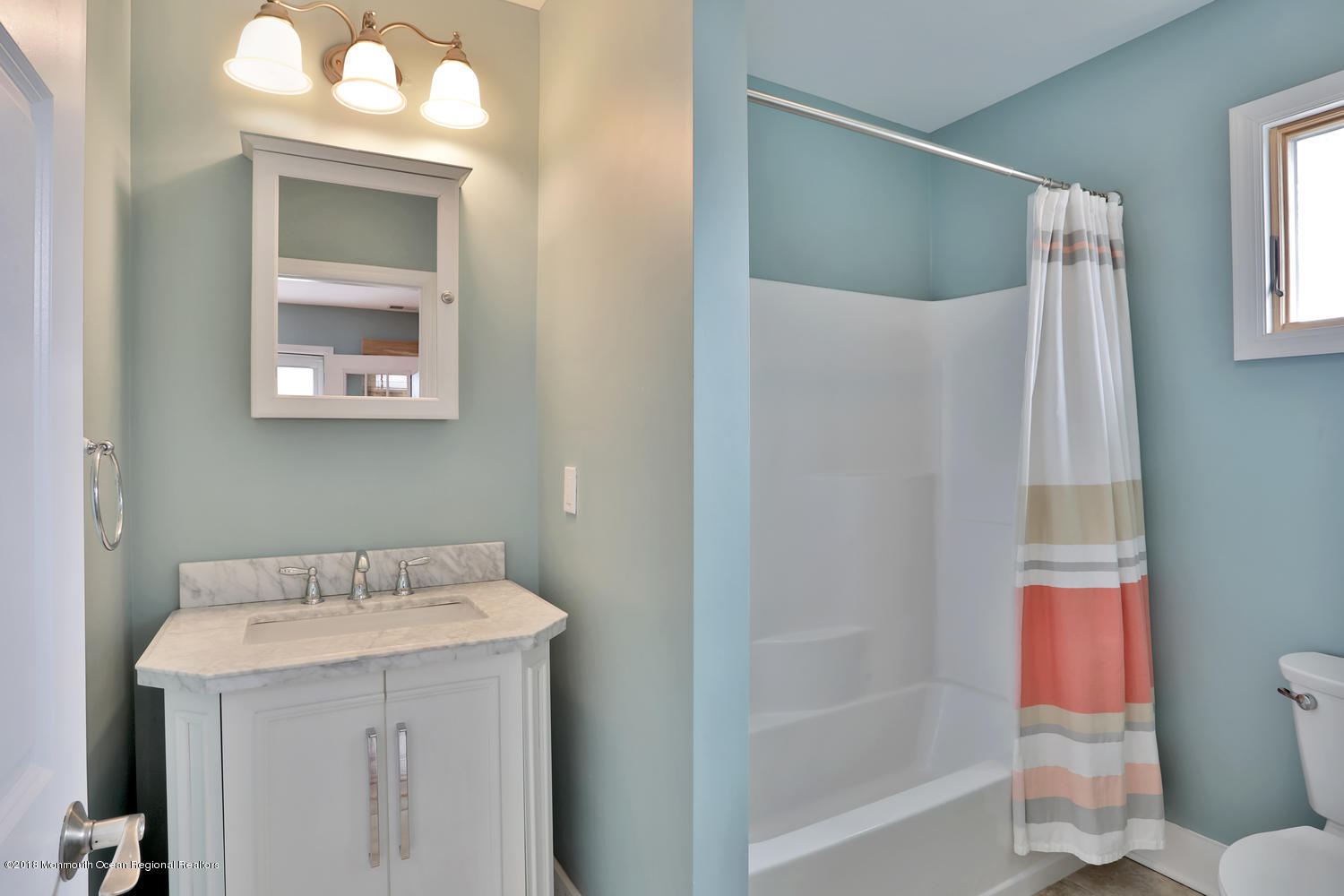 1 Beach Way, Unit A Sea Bright, NJ 07760 - Photo 8 of 15 a bathroom with a sink and a mirror