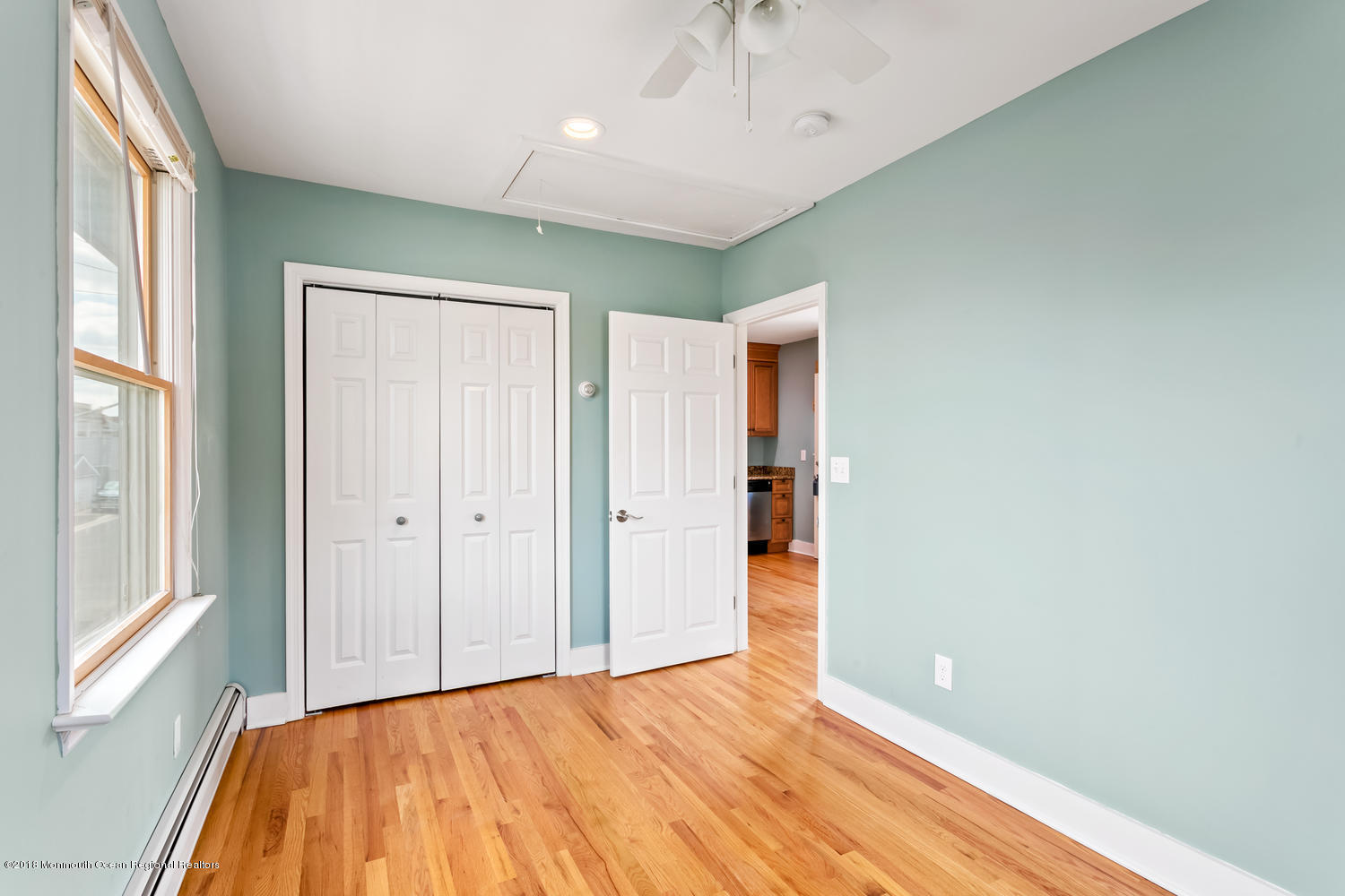1 Beach Way, Unit A Sea Bright, NJ 07760 - Photo 9 of 15 a view of a room with wooden floor and natural light