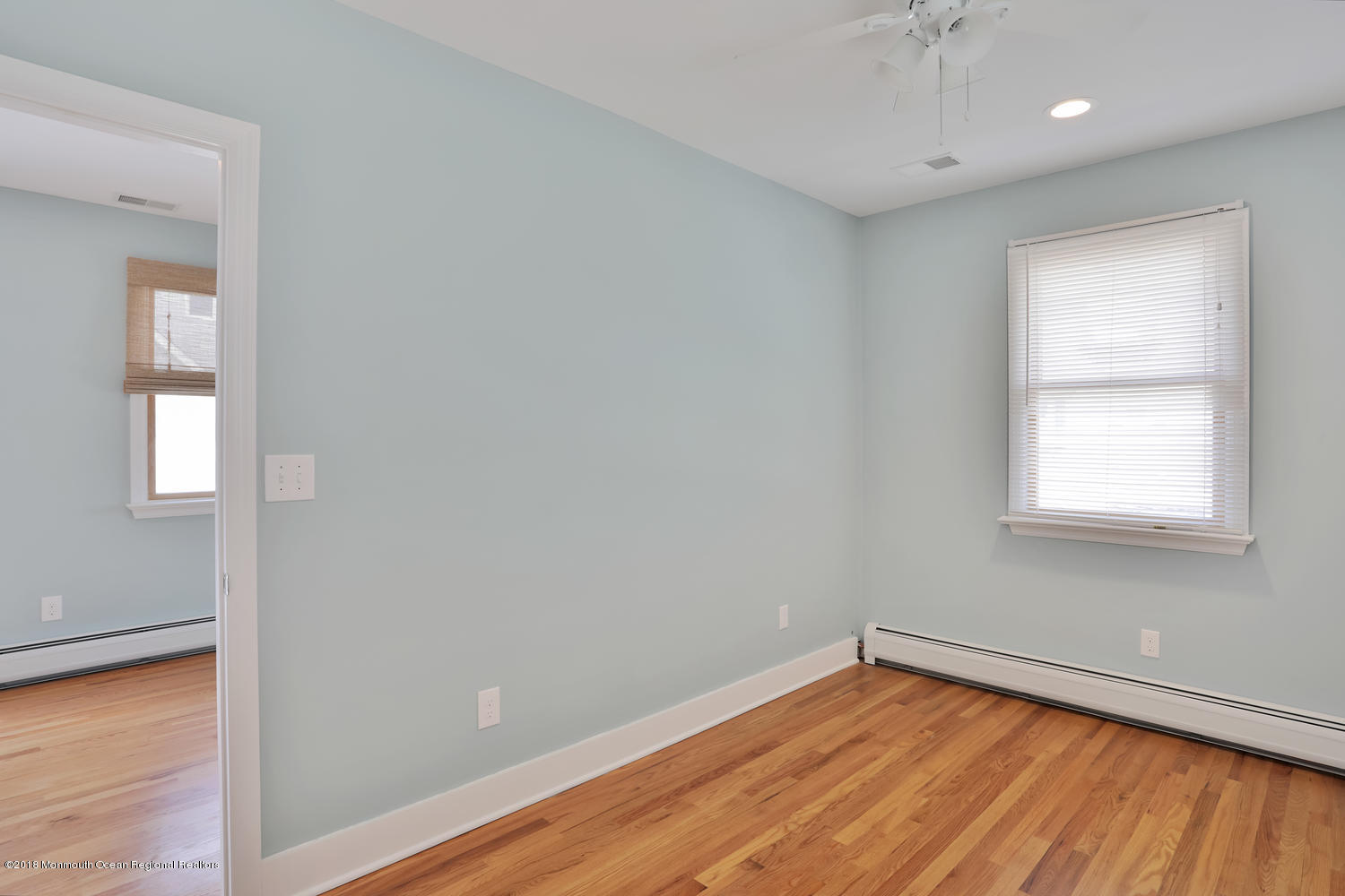 1 Beach Way, Unit A Sea Bright, NJ 07760 - Photo 10 of 15 wooden floor in an empty room with a window