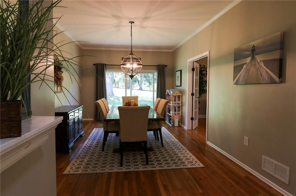 342 Weber Road Sewickley, PA 15143 - Photo 8 of 25 The Dining Room with Newer Light Fixture and Recently Installed Sliding Door to the Side and Rear Yard.
