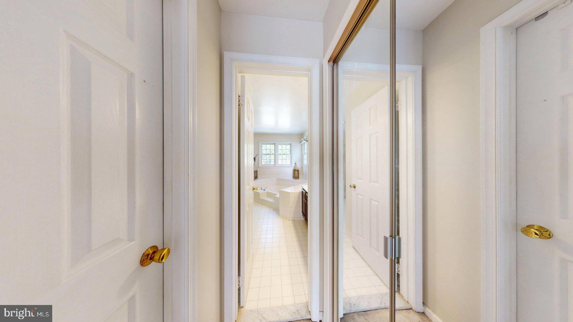 11901 Rustic Farm Court Germantown, MD 20874 - Photo 58 of 134 Inviting hallway to serene bath retreat.