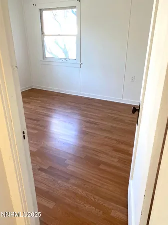a bathroom with a sink a mirror and shower
