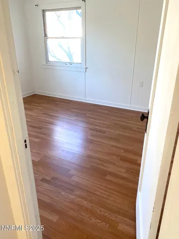 a bathroom with a sink a mirror and shower