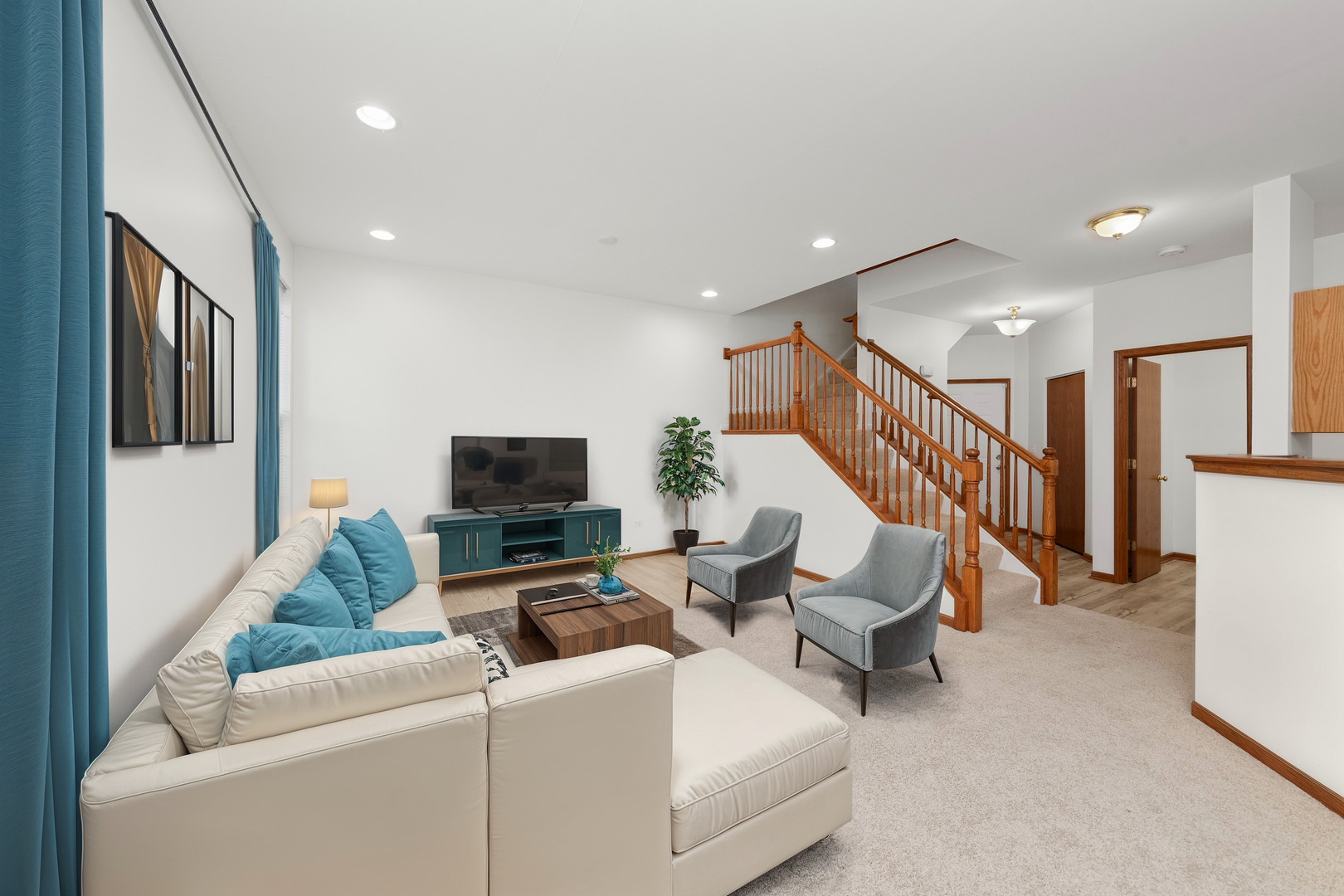 278 South Oak Creek Lane Romeoville, IL 60446 - Photo 4 of 16 a living room with furniture and a flat screen tv