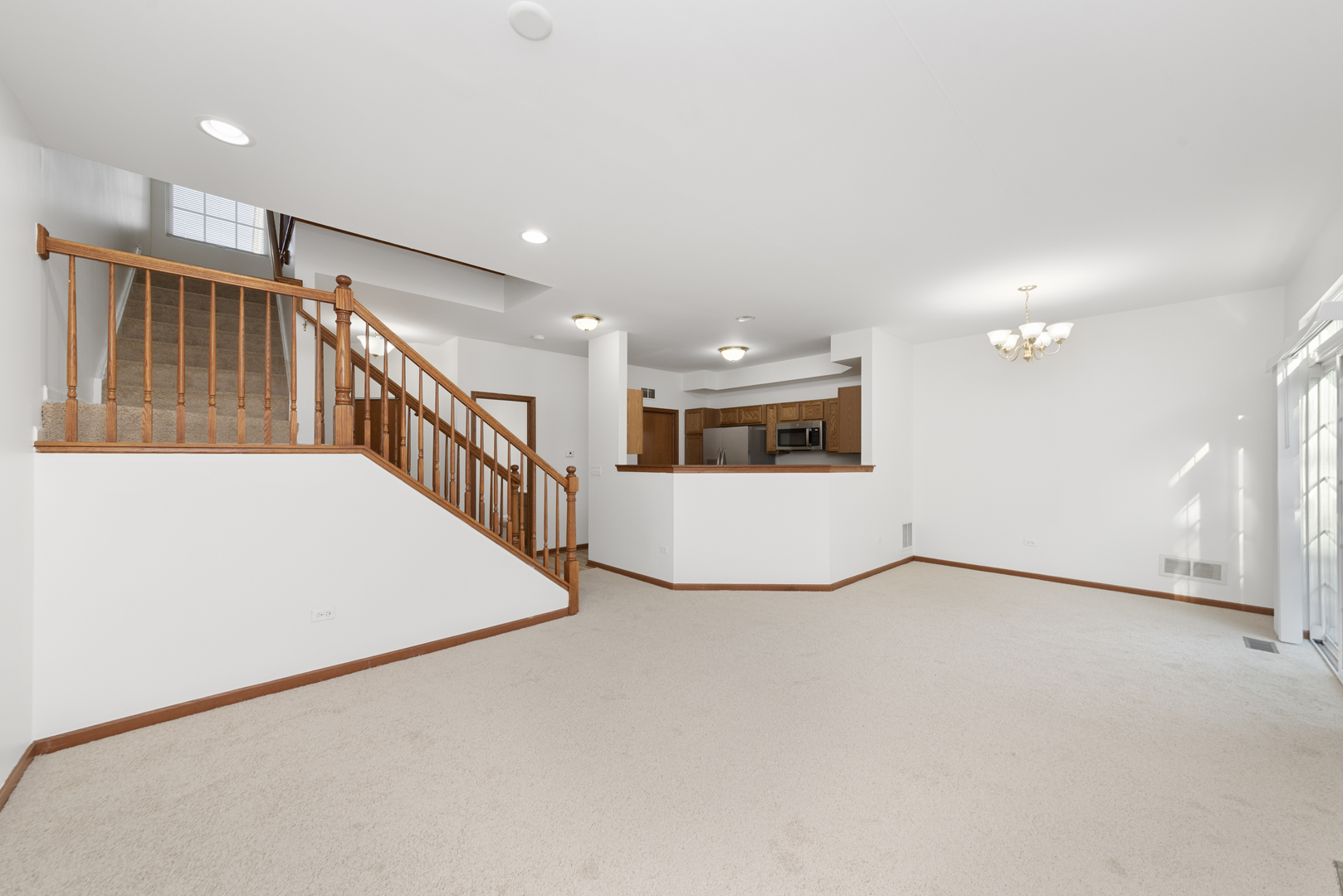 278 South Oak Creek Lane Romeoville, IL 60446 - Photo 5 of 16 a view of an empty room with stairs