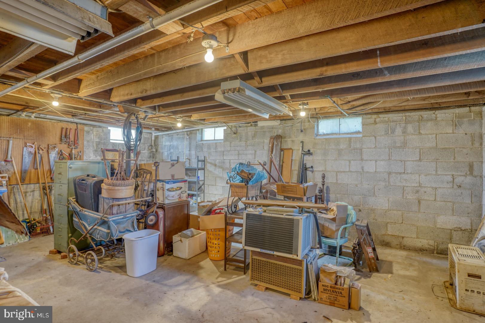 20730 Bucks Branch Road Seaford, DE 19973 - Photo 27 of 64 a view of a storage room with racks