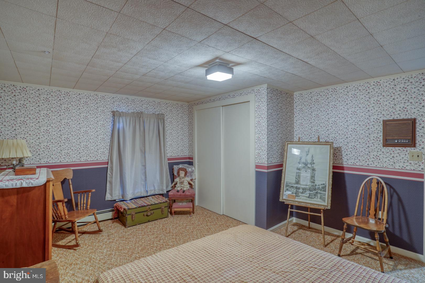 20730 Bucks Branch Road Seaford, DE 19973 - Photo 55 of 64 a bedroom with a bed and a desk