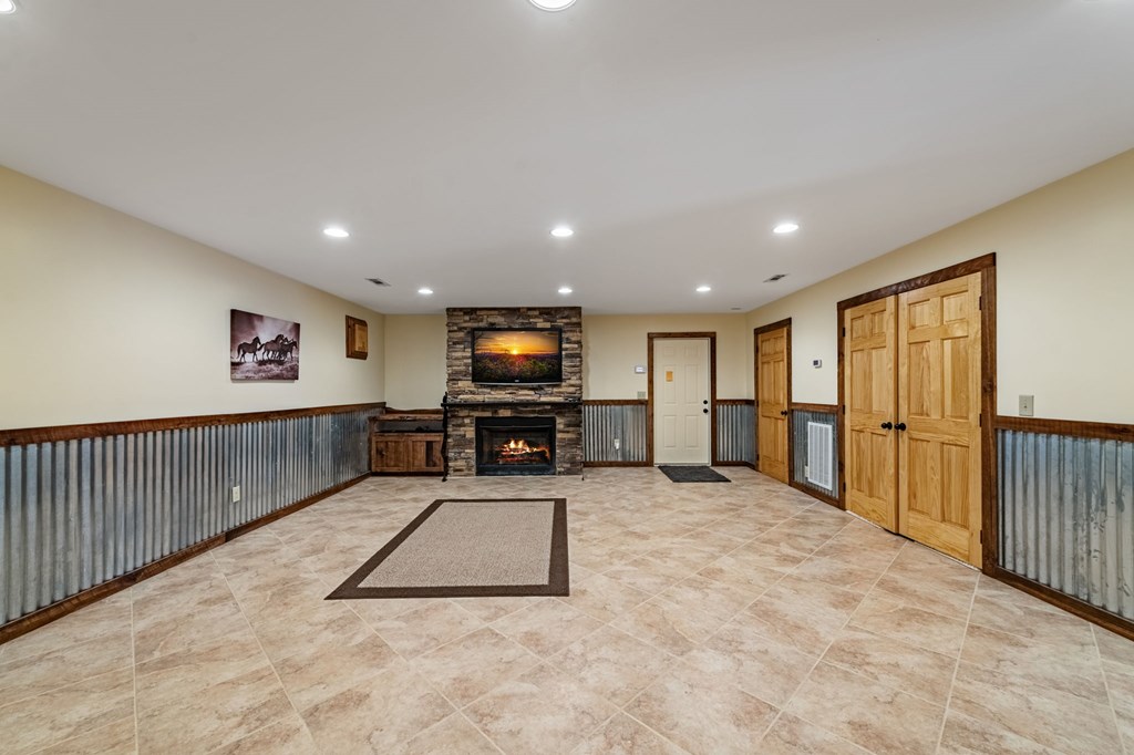 908 Cashes Valley Road Cherry Log, GA 30522 - Photo 54 of 96 a view of a livingroom with furniture & a flat screen tv
