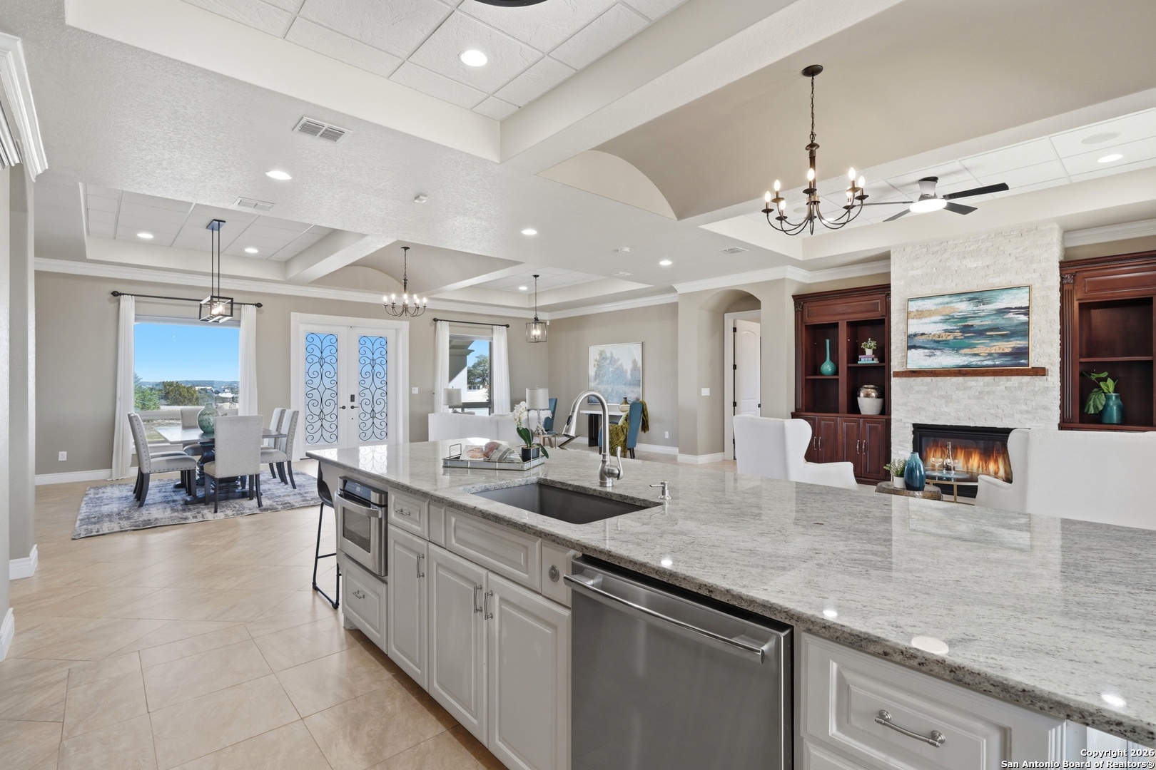 1030 Mystic Parkway Spring Branch, TX 78070 - Photo 14 of 63 a large kitchen with a counter space a sink appliances and dining table