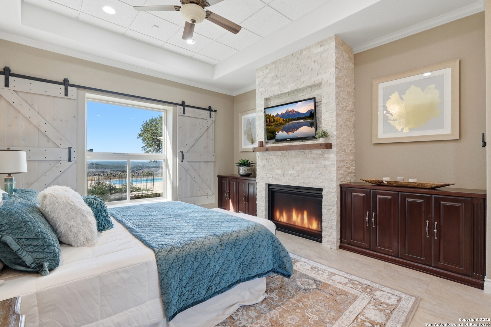 1030 Mystic Parkway Spring Branch, TX 78070 - Photo 22 of 63 a bedroom with a bed and a fireplace