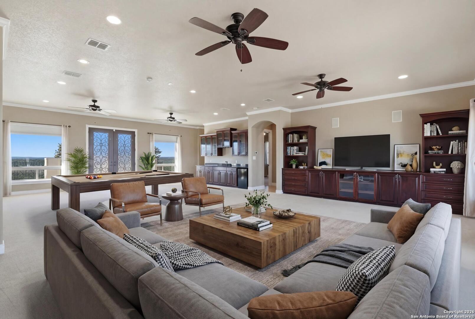 1030 Mystic Parkway Spring Branch, TX 78070 - Photo 31 of 63 a living room with furniture kitchen view and a flat screen tv