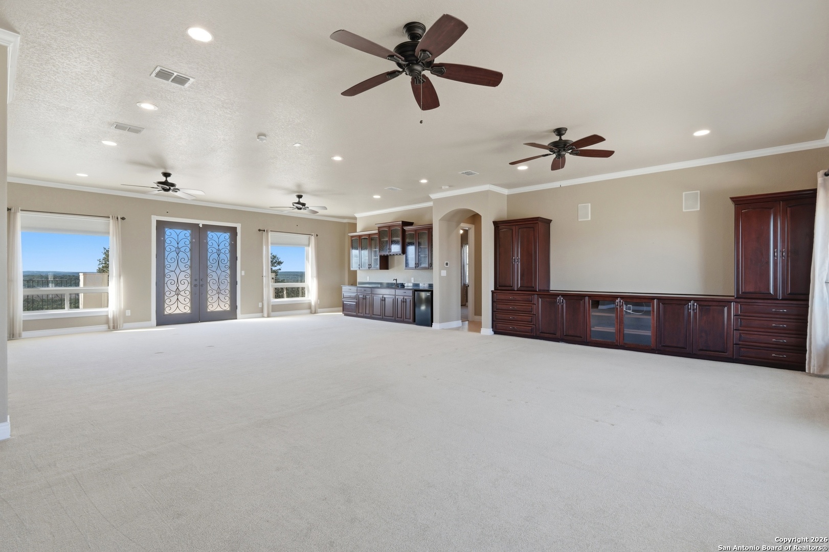 1030 Mystic Parkway Spring Branch, TX 78070 - Photo 32 of 63 a view of an empty room with a ceiling fan and window