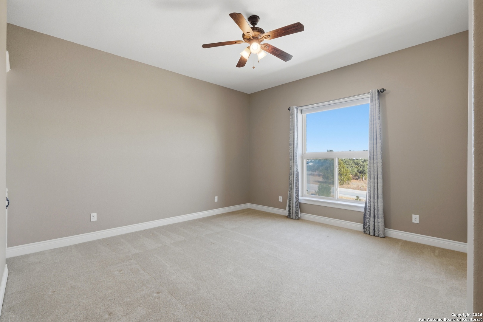 1030 Mystic Parkway Spring Branch, TX 78070 - Photo 36 of 63 wooden floor in an empty room with a window