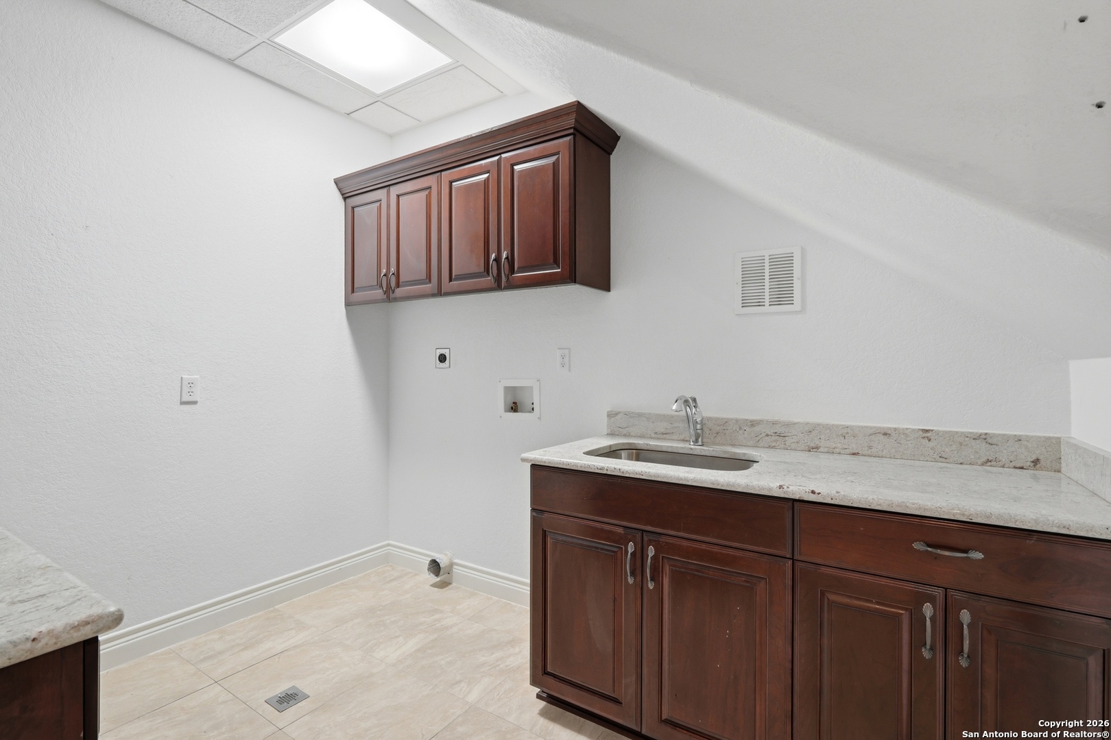 1030 Mystic Parkway Spring Branch, TX 78070 - Photo 39 of 63 a bathroom with a granite countertop sink and a mirror