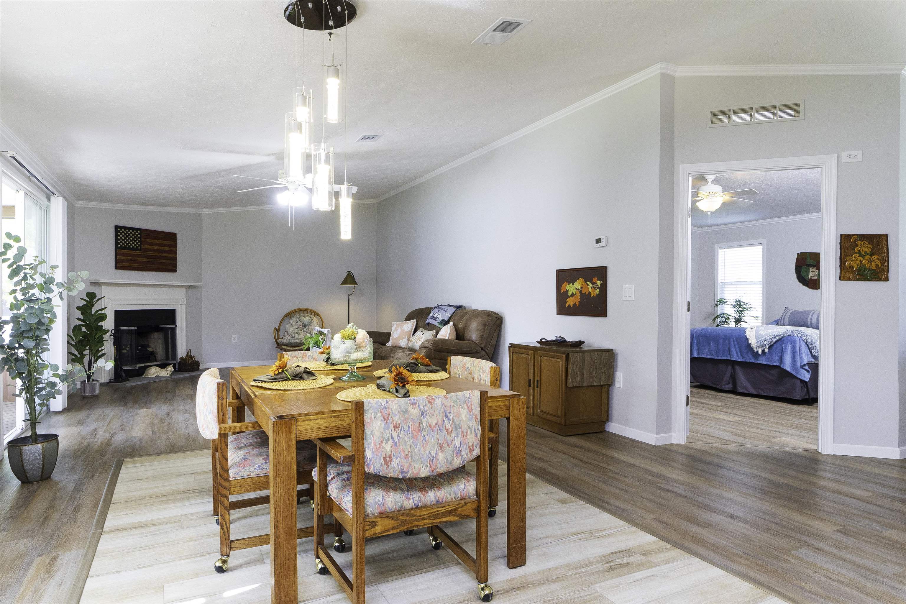 2232 Whippoorwill Drive St. Augustine, FL 32084 - Photo 16 of 51 a view of a dining room with furniture and wooden floor