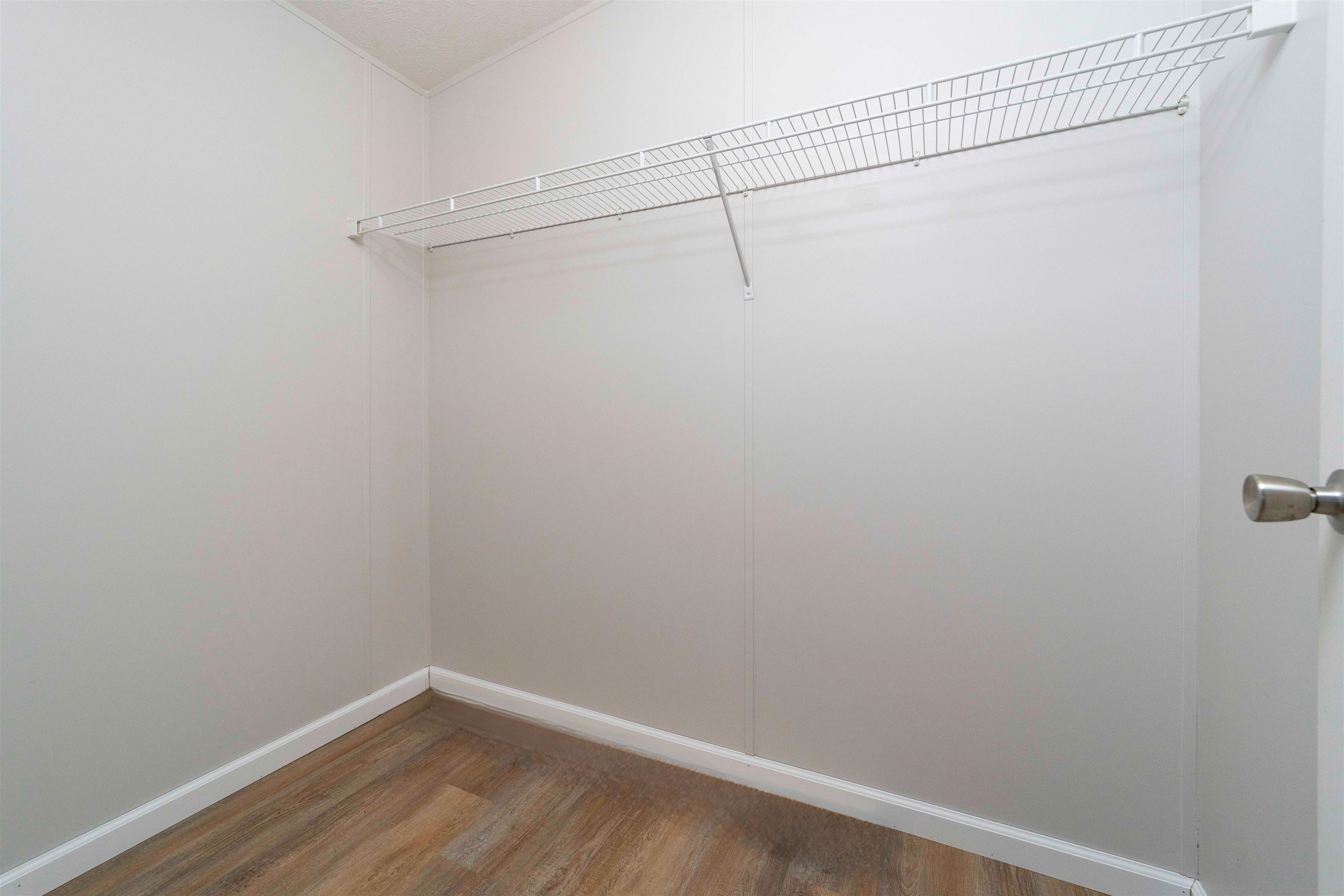2232 Whippoorwill Drive St. Augustine, FL 32084 - Photo 26 of 51 a view of a room with racks on the wall