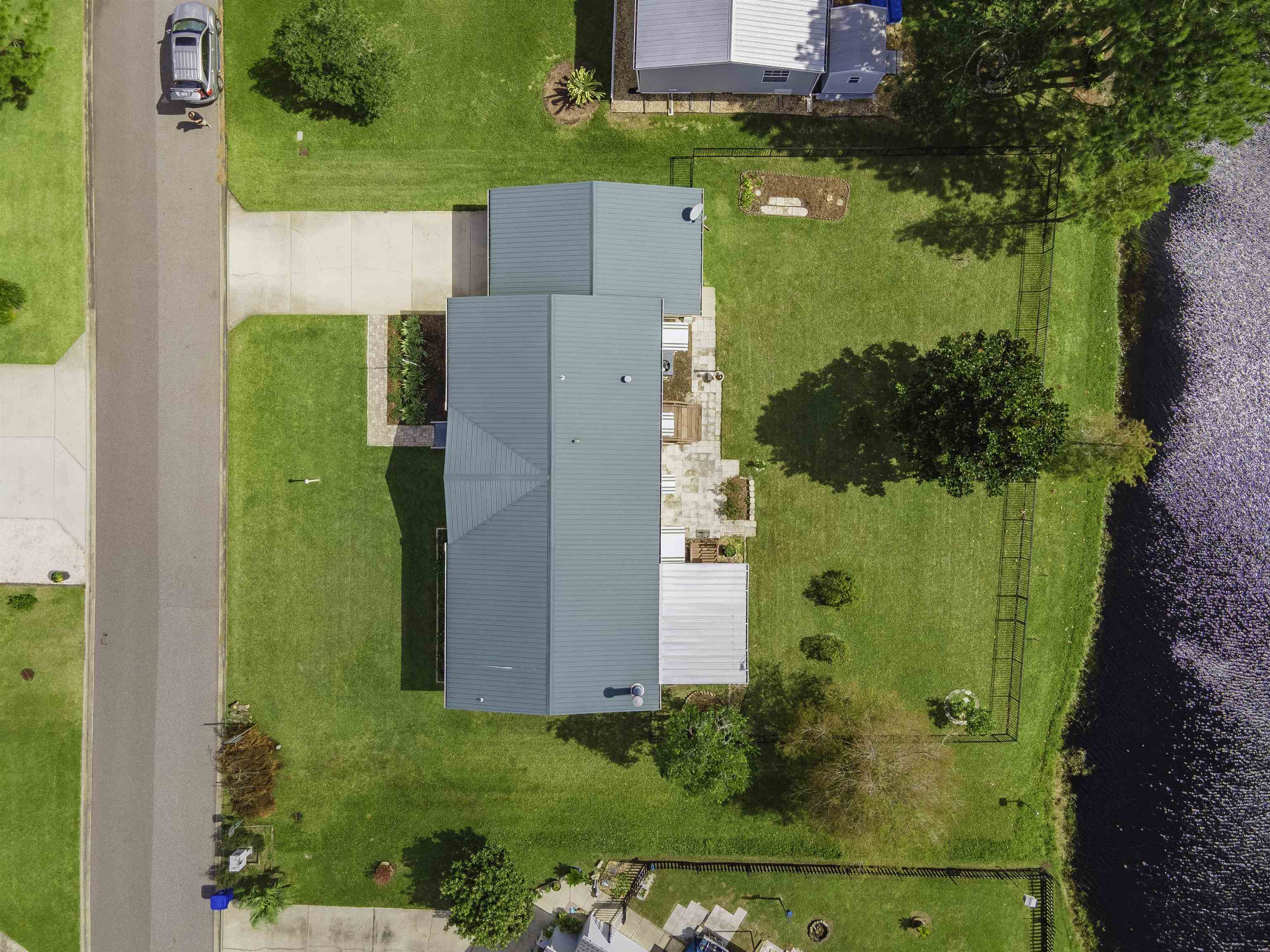 2232 Whippoorwill Drive St. Augustine, FL 32084 - Photo 45 of 51 an aerial view of a residential house with a yard