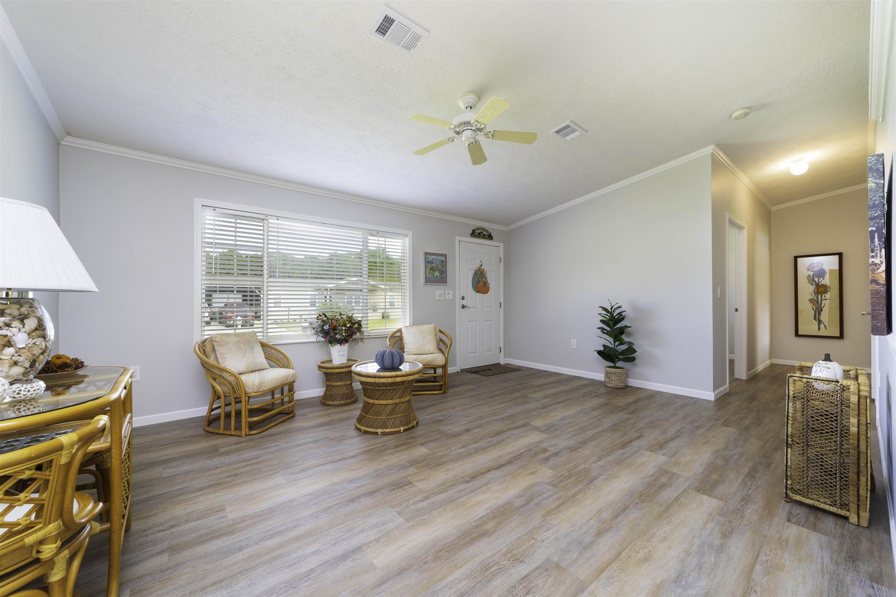 2232 Whippoorwill Drive St. Augustine, FL 32084 - Photo 5 of 51 a living room with furniture and wooden floor