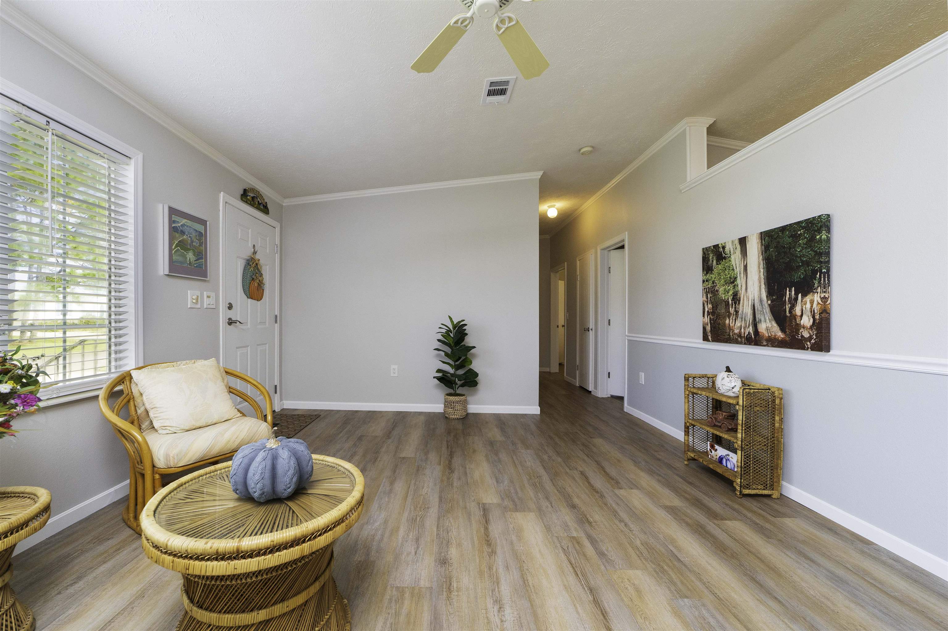 2232 Whippoorwill Drive St. Augustine, FL 32084 - Photo 6 of 51 a living room with furniture and a wooden floor