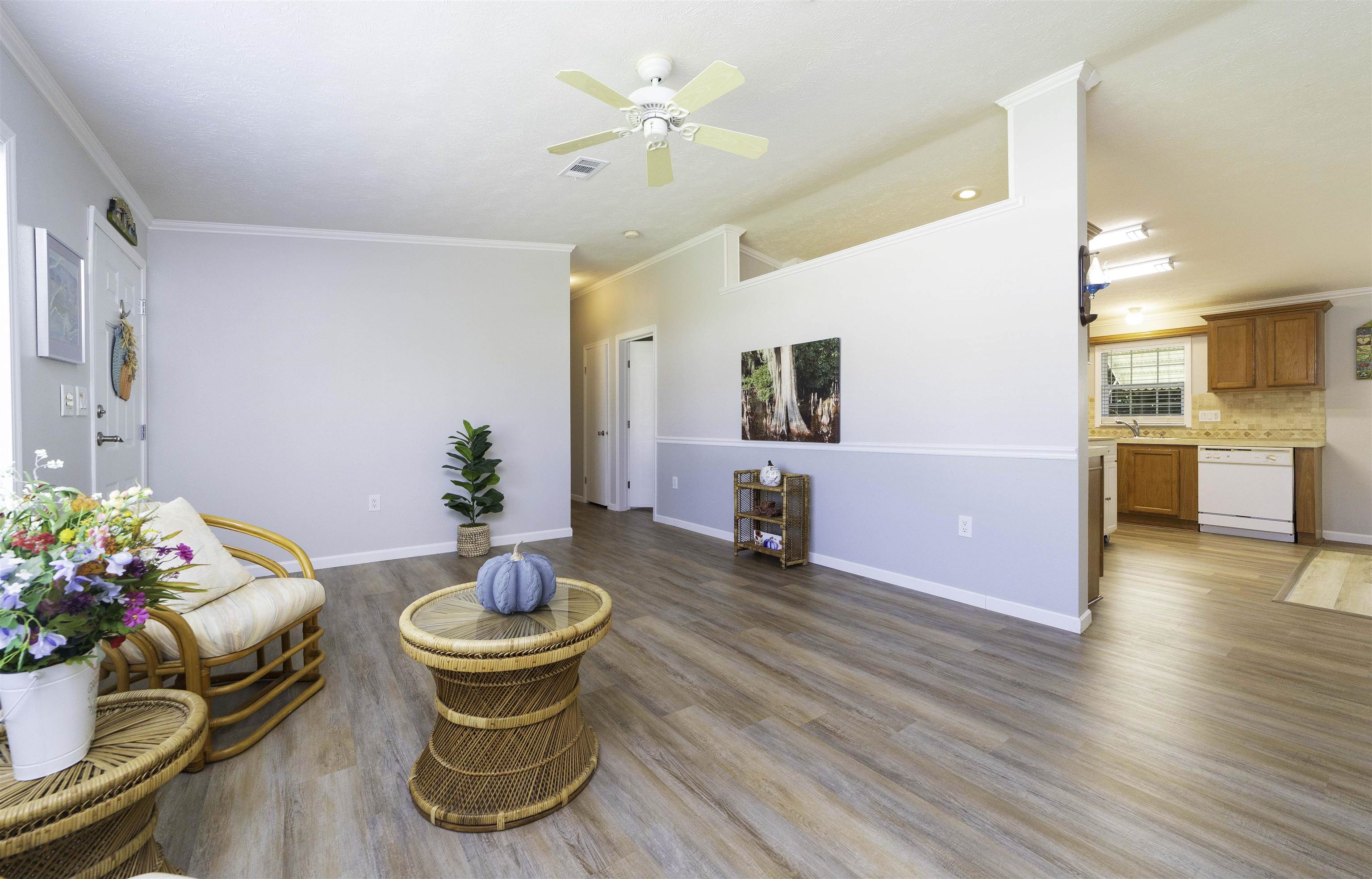 2232 Whippoorwill Drive St. Augustine, FL 32084 - Photo 7 of 51 a living room with furniture and a dining table