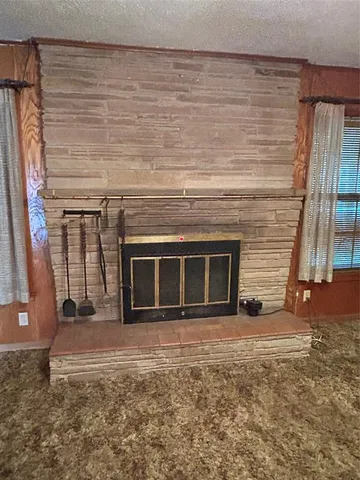 an empty room with closet area