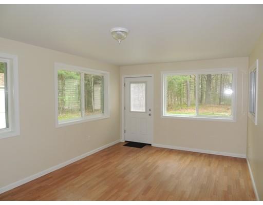 22 May Hill Road Monson, MA 01057 - Photo 15 of 25 a view of an empty room with wooden floor and a window