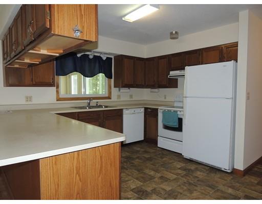 22 May Hill Road Monson, MA 01057 - Photo 16 of 25 a kitchen with a stove a refrigerator and a sink
