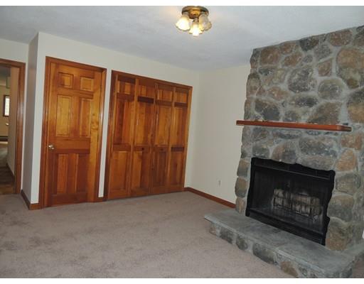 22 May Hill Road Monson, MA 01057 - Photo 5 of 25 a view of an empty room with a fireplace