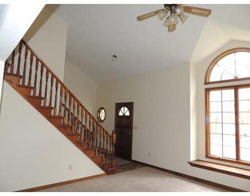 22 May Hill Road Monson, MA 01057 - Photo 8 of 25 a view of staircase with railing and a chandelier