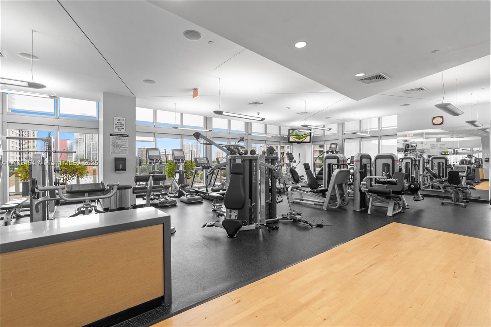 79 Southwest 12th Street, Unit 2001S Miami, FL 33130 - Photo 23 of 29 a gym room that has a lot of gym equipment
