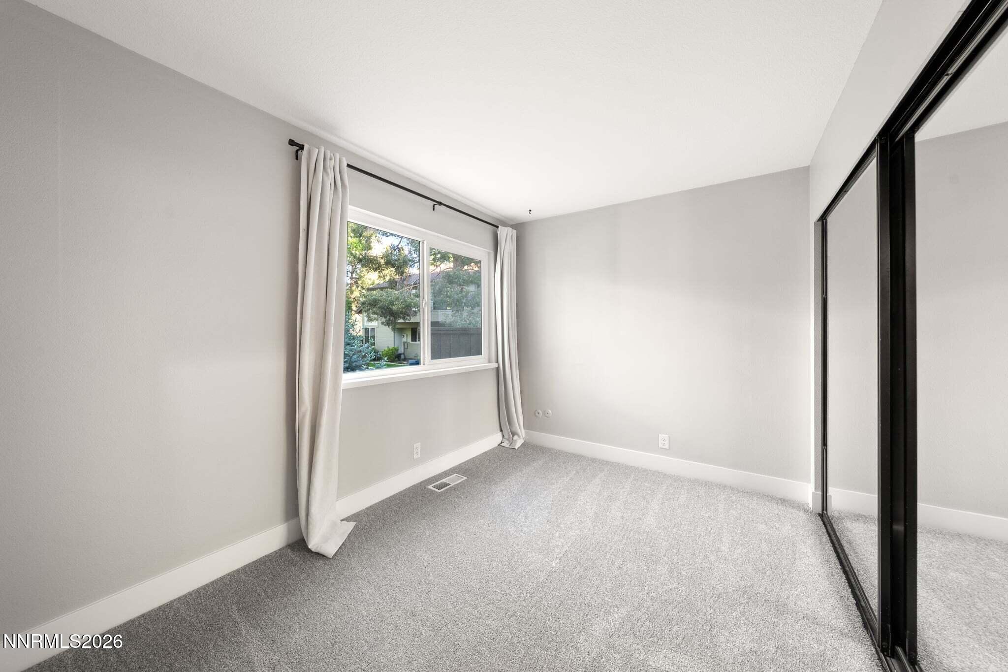 430 Angela Place Reno, NV 89509 - Photo 24 of 48 a view of an empty room with a window