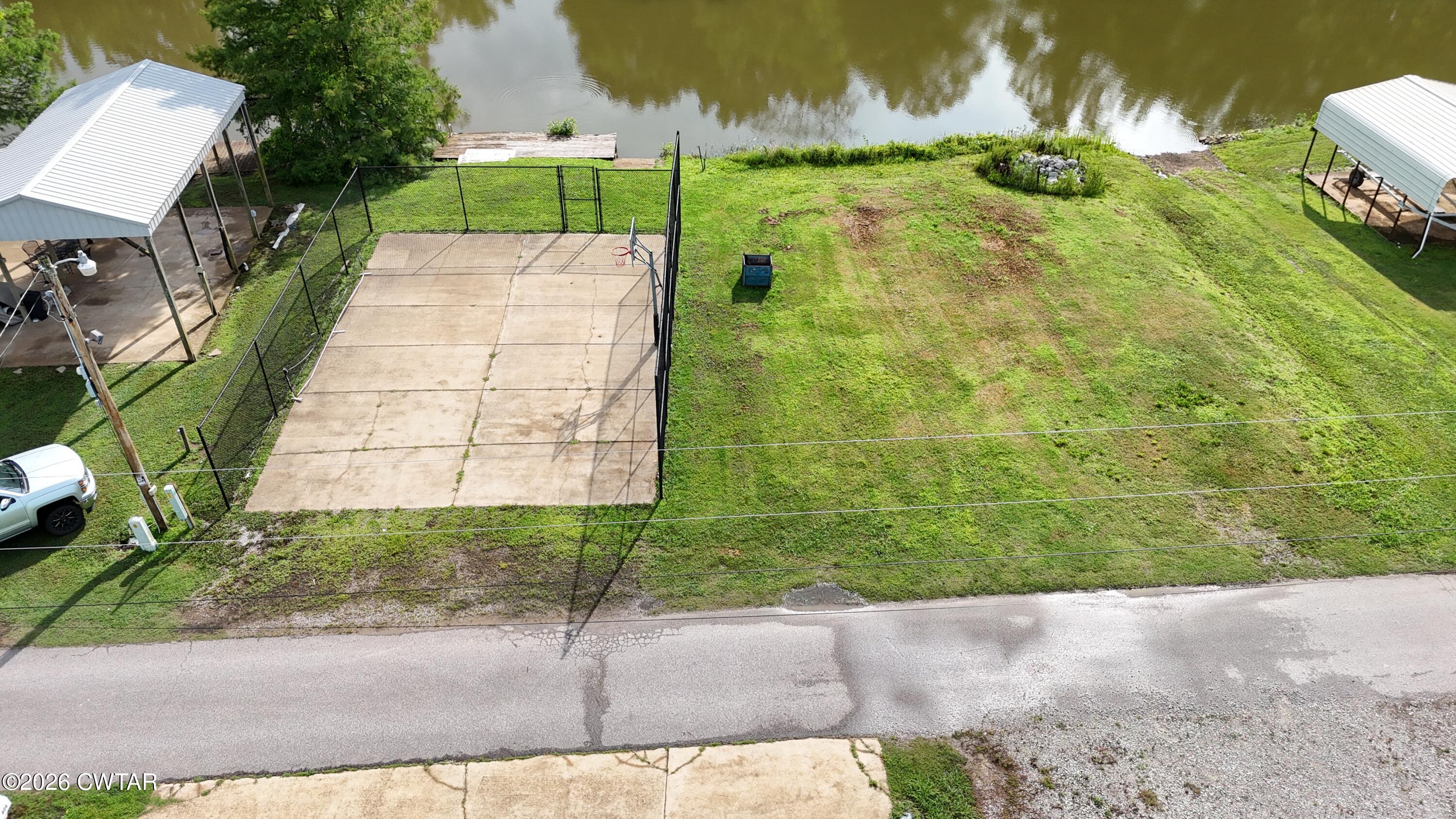 404 Lagoon Lane Decaturville, TN 38329 - Photo 17 of 23 DJI_20260612181639_0443_D