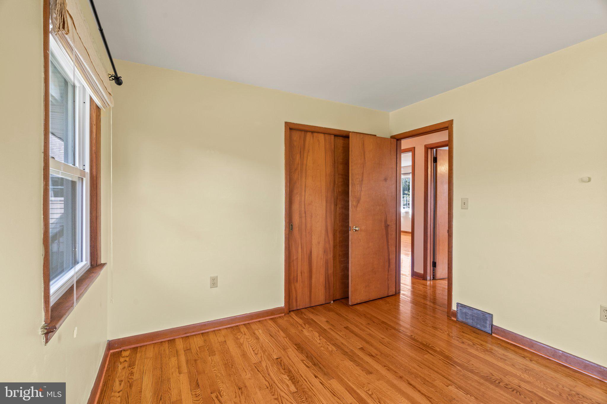 281 Pennington - Harbourton Road Pennington, NJ 08534 - Photo 29 of 35 a view of an empty room with wooden floor and a window