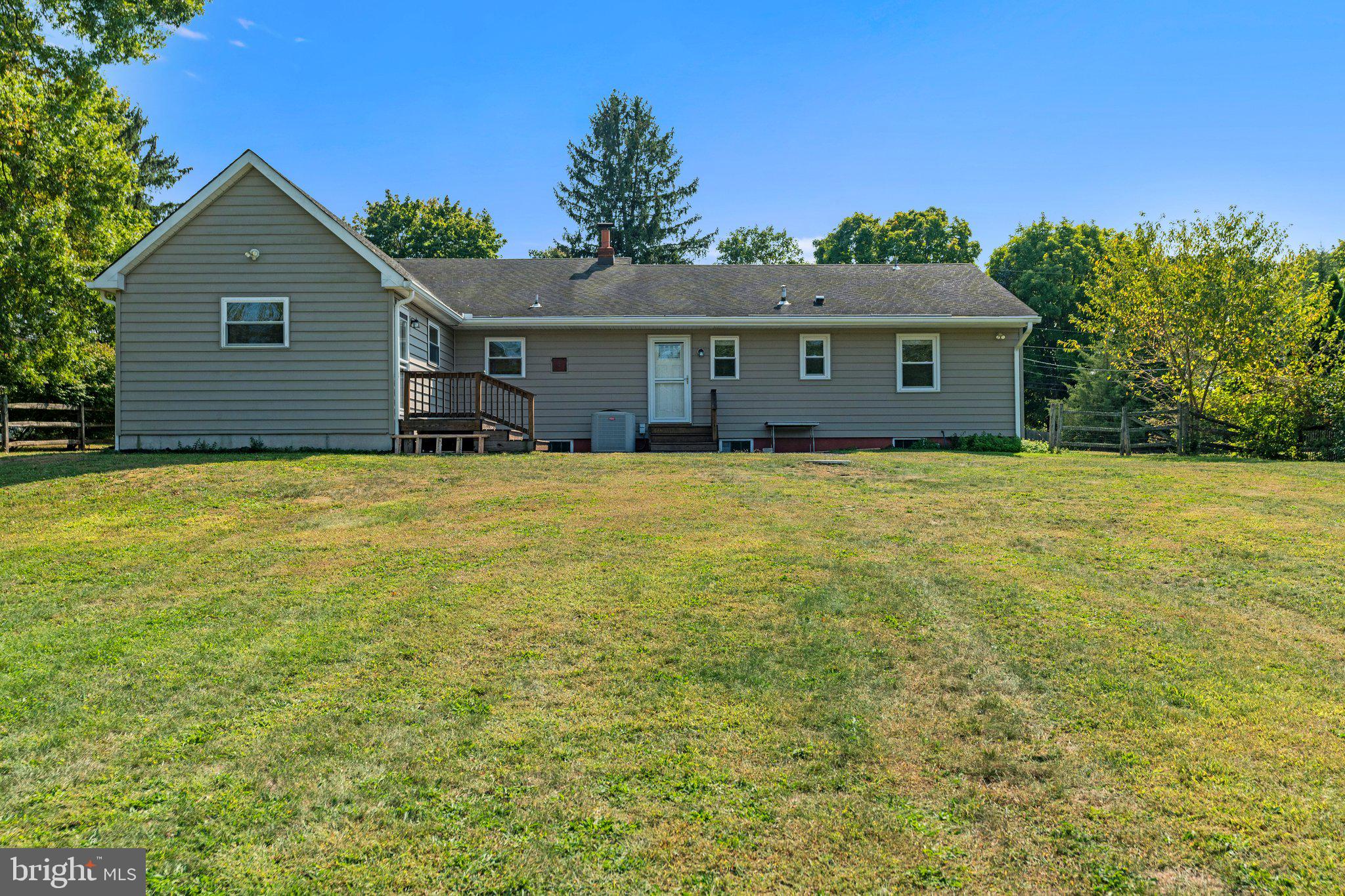 281 Pennington - Harbourton Road Pennington, NJ 08534 - Photo 31 of 35 a house with huge green field in front of it