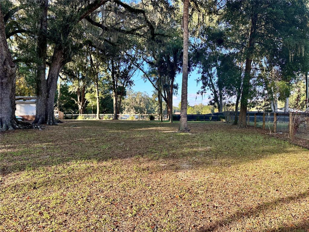 13565 Northeast 38th Avenue Anthony, FL 32617 - Photo 28 of 39 a view of outdoor space with trees