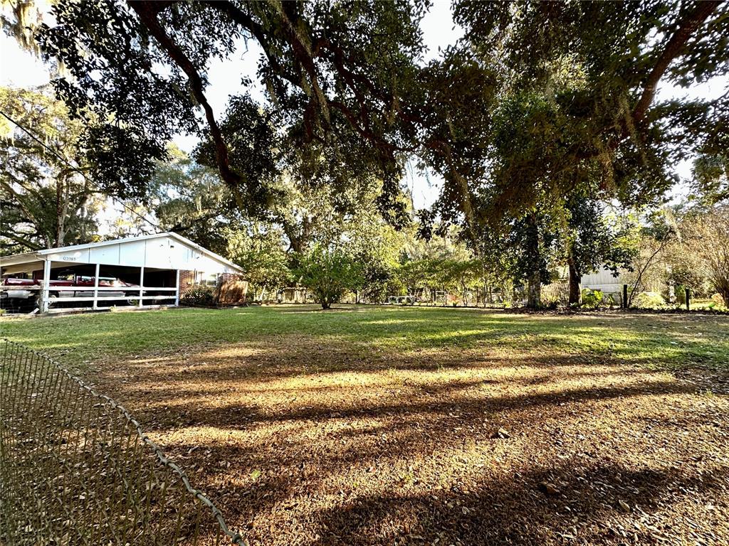13565 Northeast 38th Avenue Anthony, FL 32617 - Photo 36 of 39 a view of a town with large trees