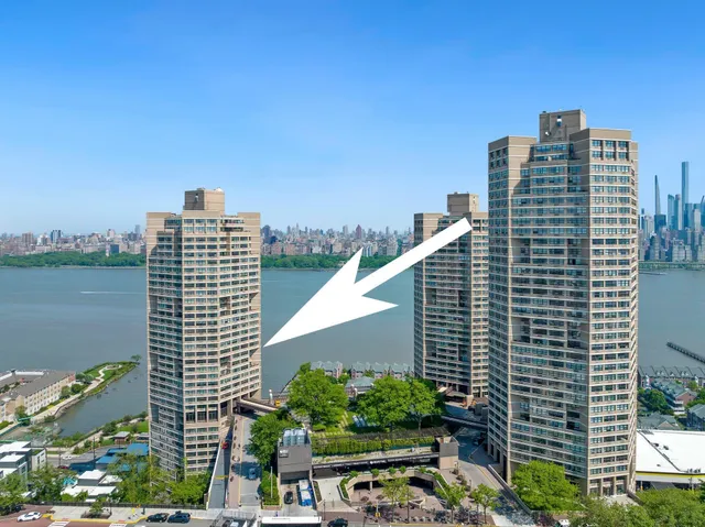 a view of a city with tall buildings