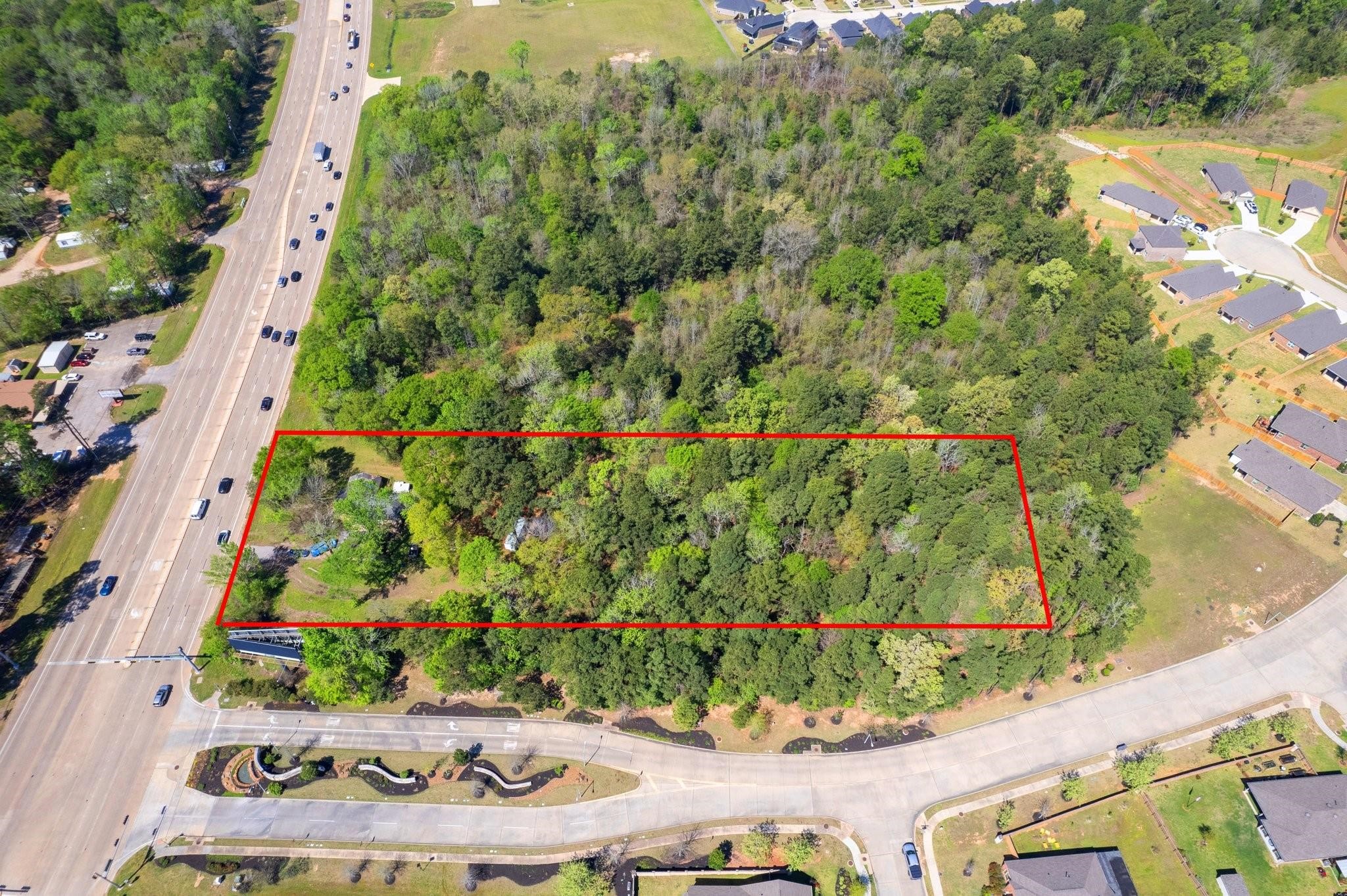 6020 Highway 105 Conroe, TX 77304 - Photo 6 of 10 an aerial view of a city