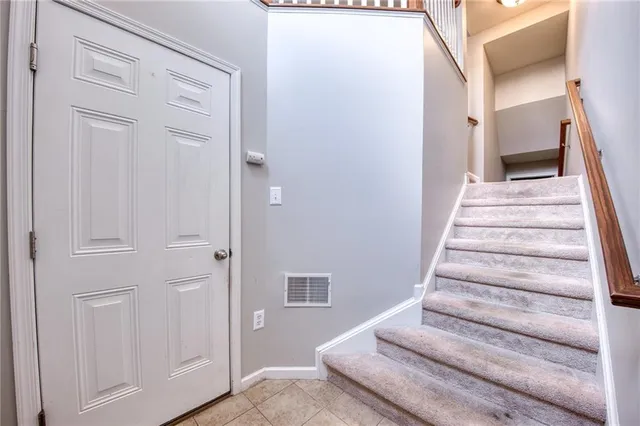 a view of an entryway with staircase