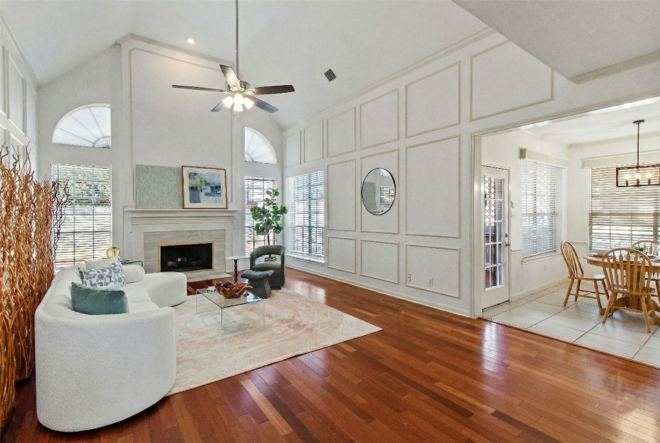 5127 Heathfield Court Houston, TX 77084 - Photo 1 of 37 Large windows provide plenty of natural light and the living room is open to the breakfast room and kitchen.