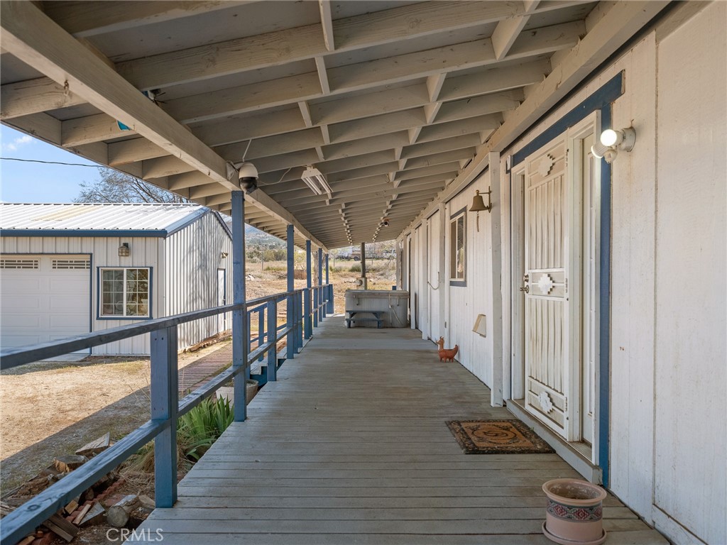 599 Smoke Tree Road Pinon Hills, CA 92372 - Photo 21 of 34 a view of a porch