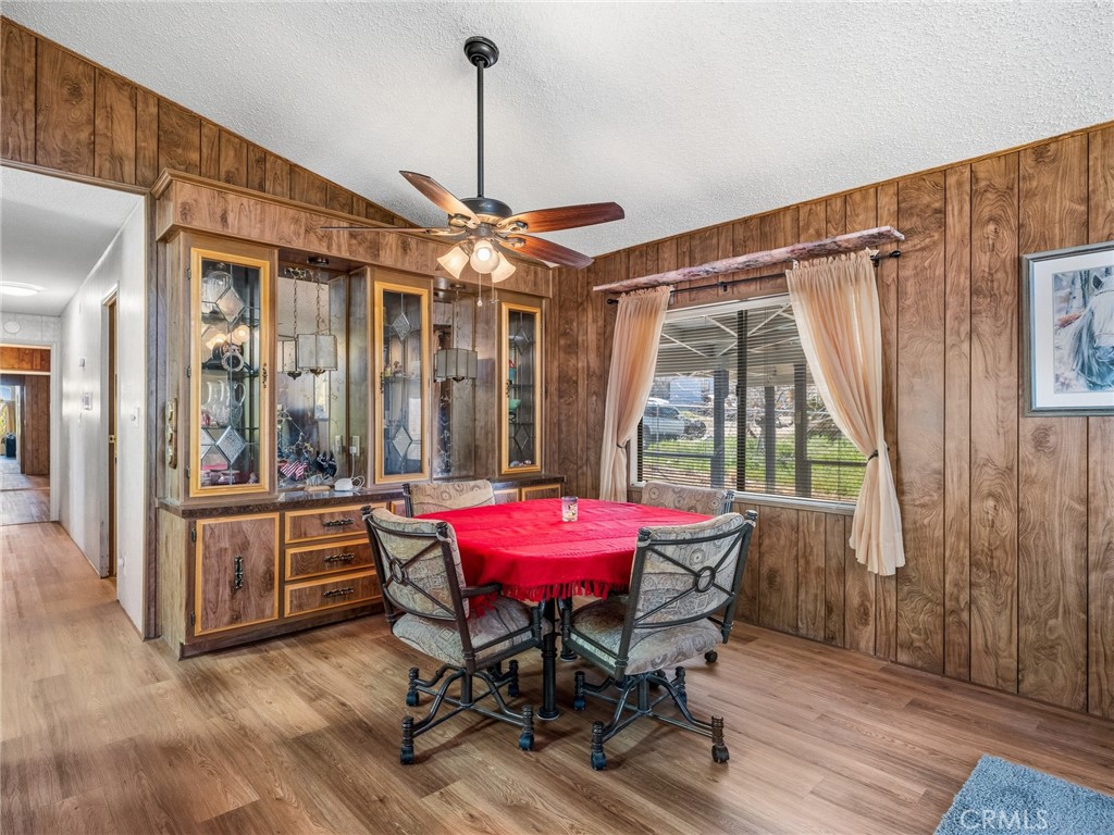 599 Smoke Tree Road Pinon Hills, CA 92372 - Photo 10 of 34 a dining room with furniture and window
