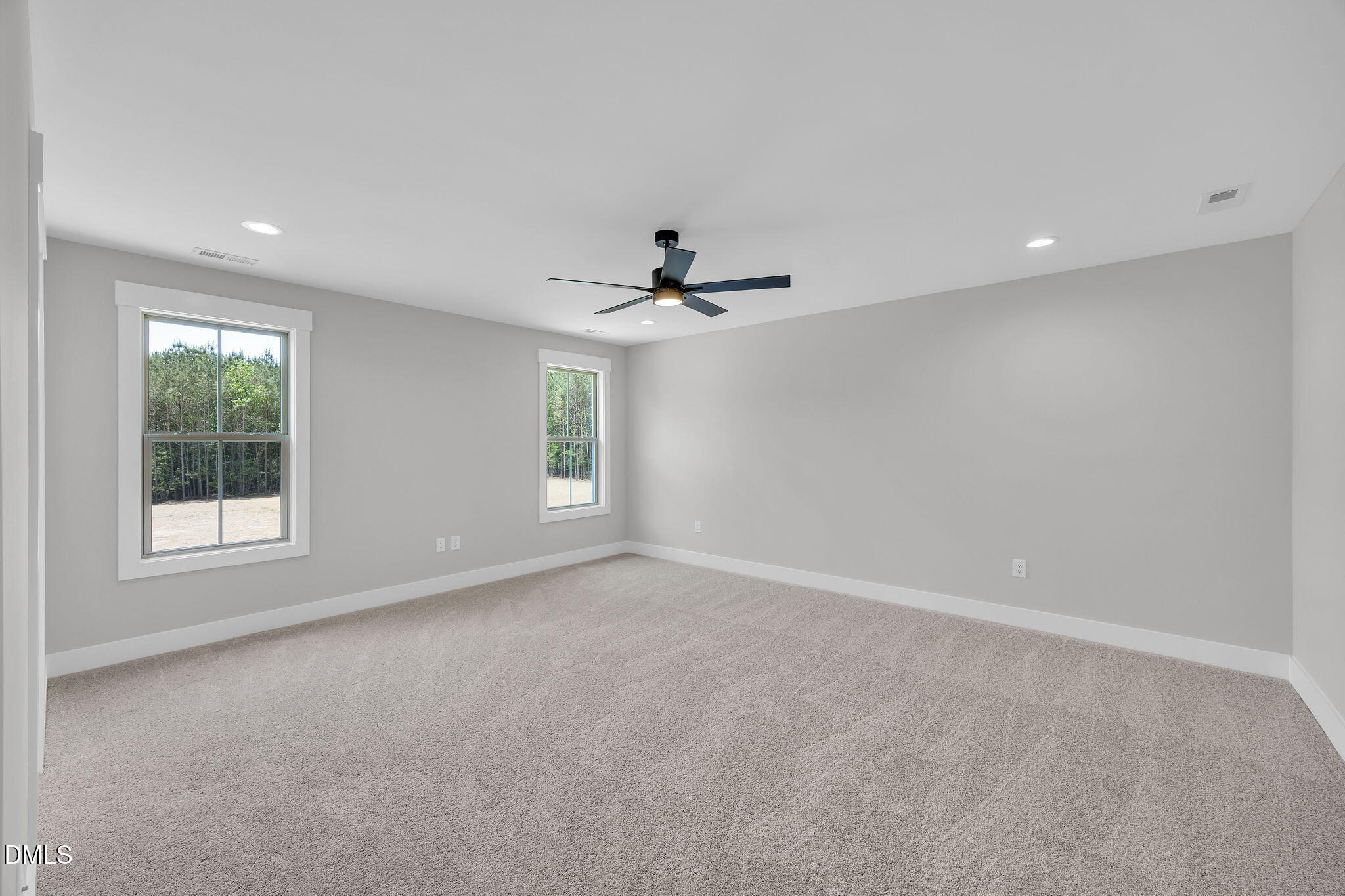 378 Freedom Ridge Drive Smithfield, NC 27577 - Photo 29 of 33 a view of a livingroom with a ceiling fan and window