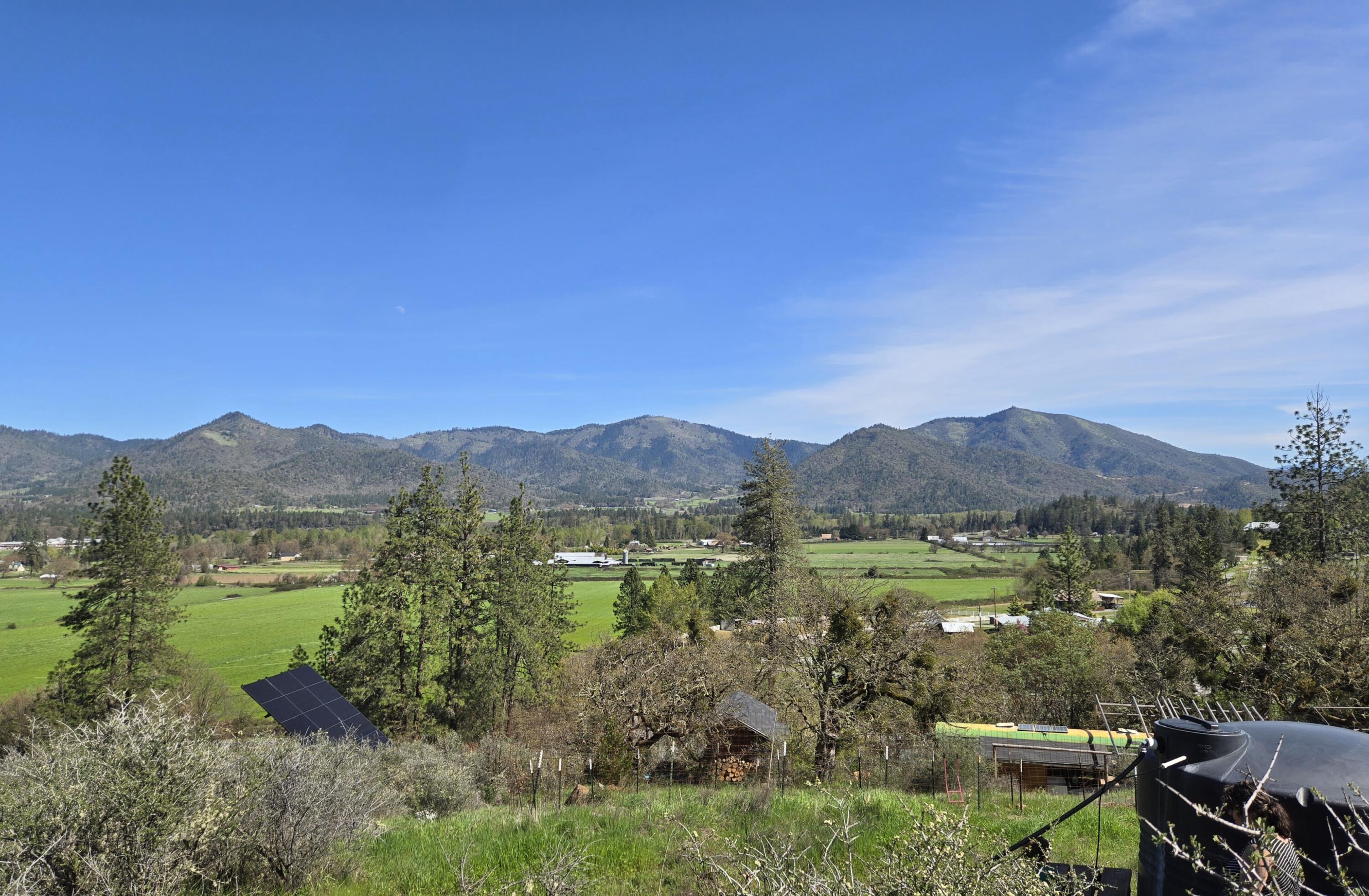 12726 Water Gap Road Williams, OR 97544 - Photo 1 of 47 a view of lake with mountain